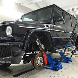 Фото-9415 Домкрат N3203 подкатной 3т 133-465мм с резин. насадкой, быстр. подъем